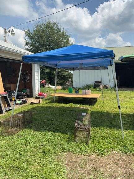 New Ozark Trail pop-up slant leg canopy 10x10 SELLER BOUGHT FOR CATALOGING ONLY FOR SHADE BECAUSE IT WAS 100° OUTSIDE! image