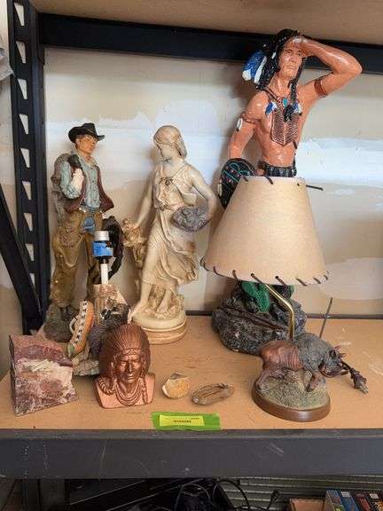 Cowboys, Indians, a woman and rocks image