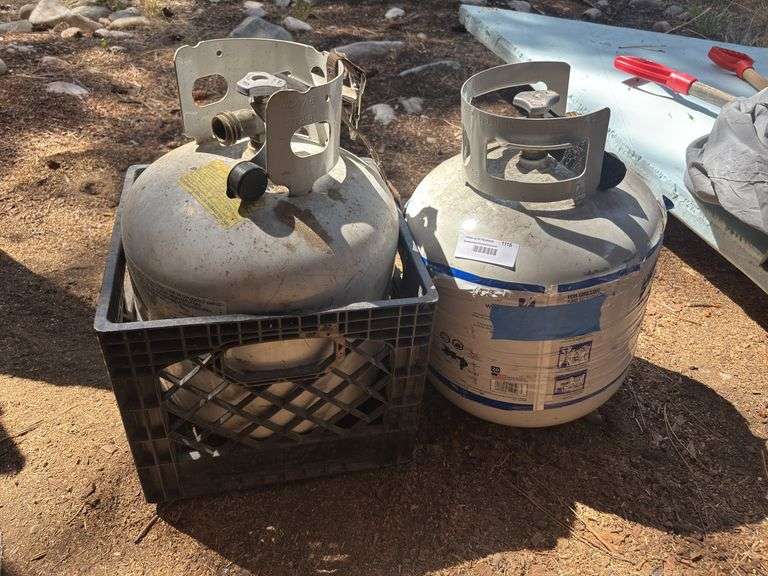 Two empty propane tanks image
