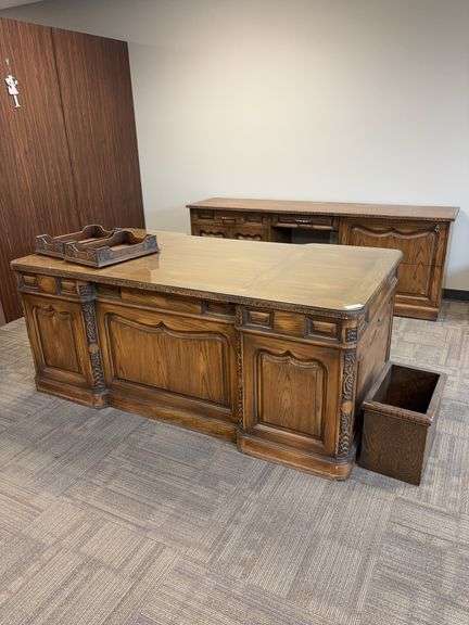 Romweber Solid Oak Desk 72x38 and credenza 84x20, 2 letter boxes and trash can. Glass piece on desk top. All match set. No stairs bring help to move image