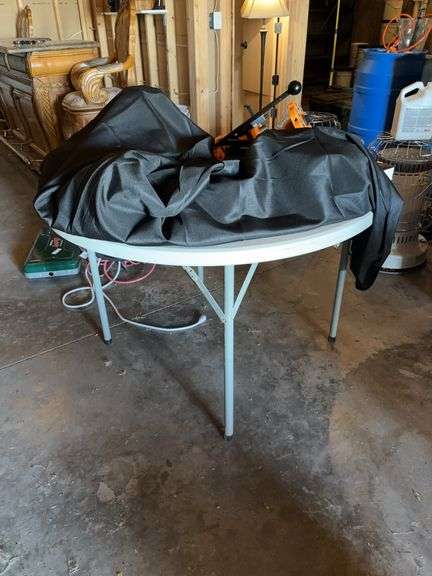 45” round folding table and black table cloth-no contents image