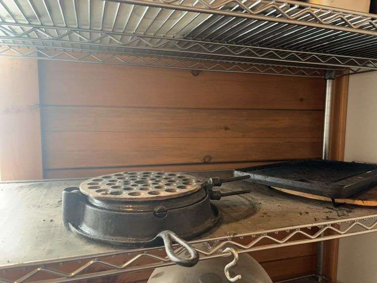 Pizza stone, cast waffle iron, griddle image