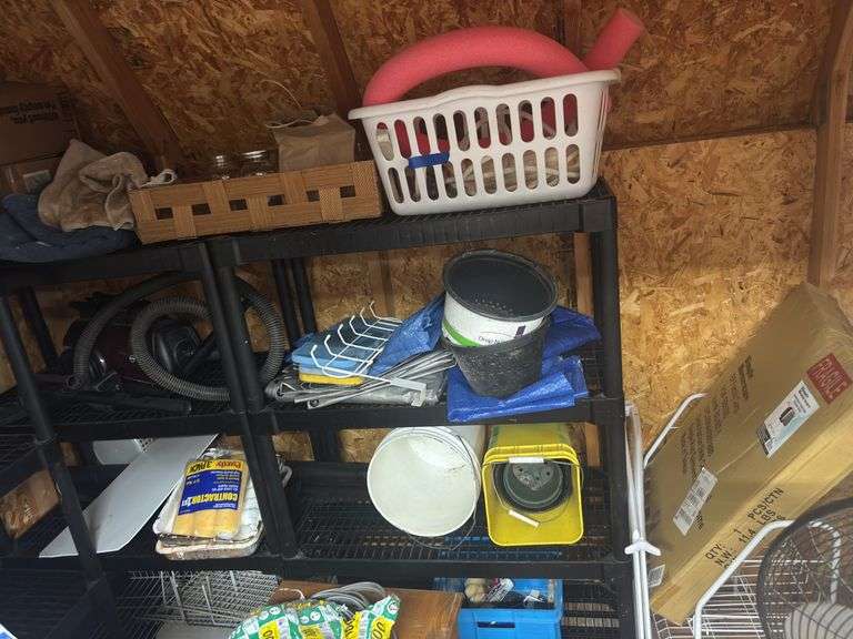 Closet racks, rolling garment rack new in box, tarps, and painting supplies, vacuum cleaner image