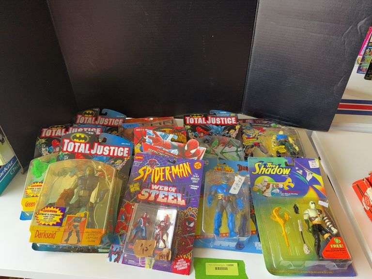 Various action figures, NIB image