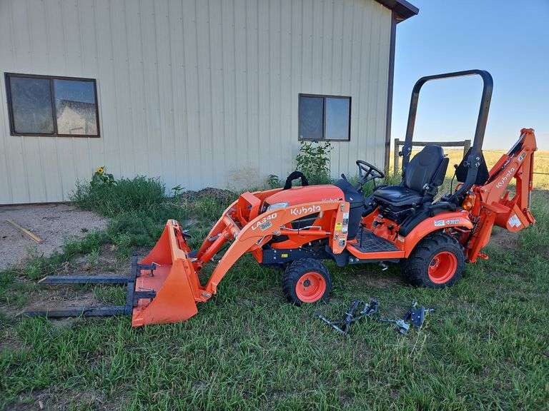 2022 Kubota BX23S 4WD Tractor Serial #69213 with Loader, Back Hoe, tiller, and blade. Hour meter reads 54.1 hours, with manual-nice condition image
