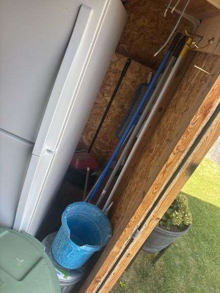Cleaning supplies, ash bucket, trashcan, assorted rugs image