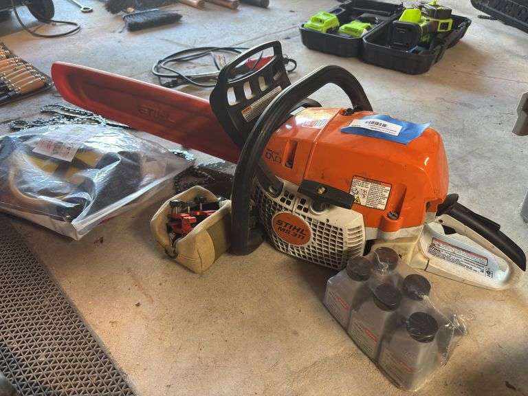 Steel MS 311 chainsaw with bar oil sharpener, safety gear extra chain image