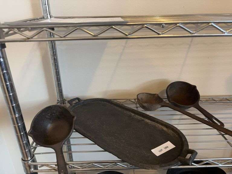 Cast oval griddle, paddles image