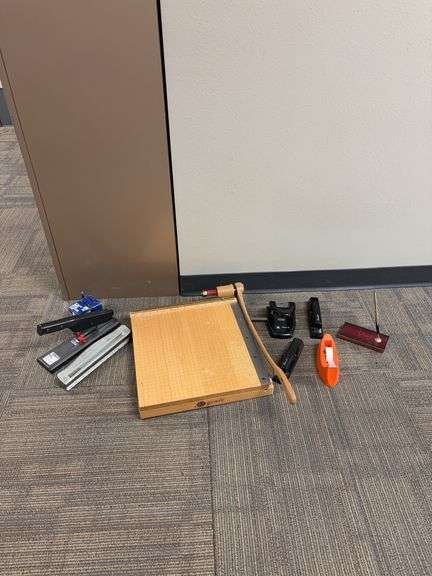 Paper cutter, hole puncher, large stapler, tape dispenser, staplers image