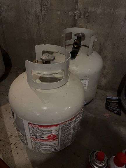 Two propane bottles-each partially full image