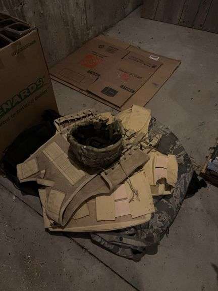 Camo helmet, vests (they have had mice around them)-need cleaned) image