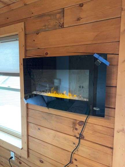 Paramount Wall has fireplace with remote  36x 19 image