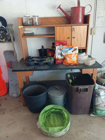 54" chemistry lab table, w/ bookcase top, used as potting table and can of potting dirt etc... image