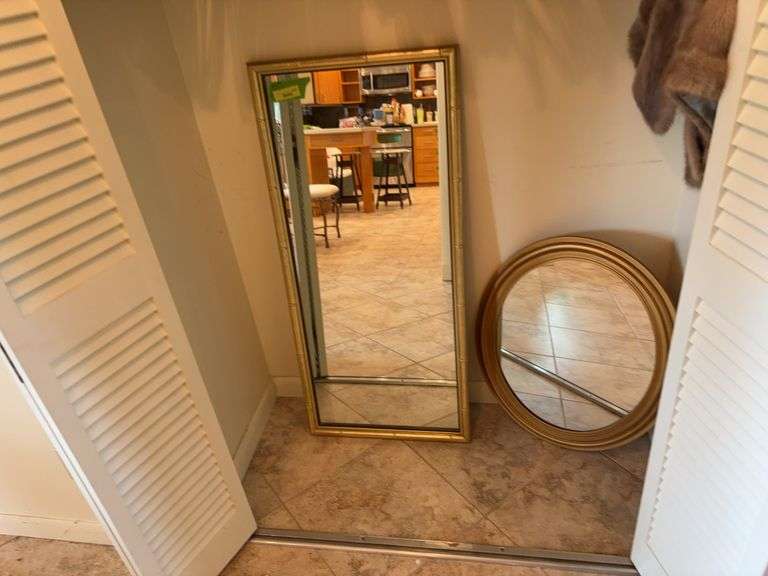 Two gold edged wall mirrors-20x44 and 21x25 image