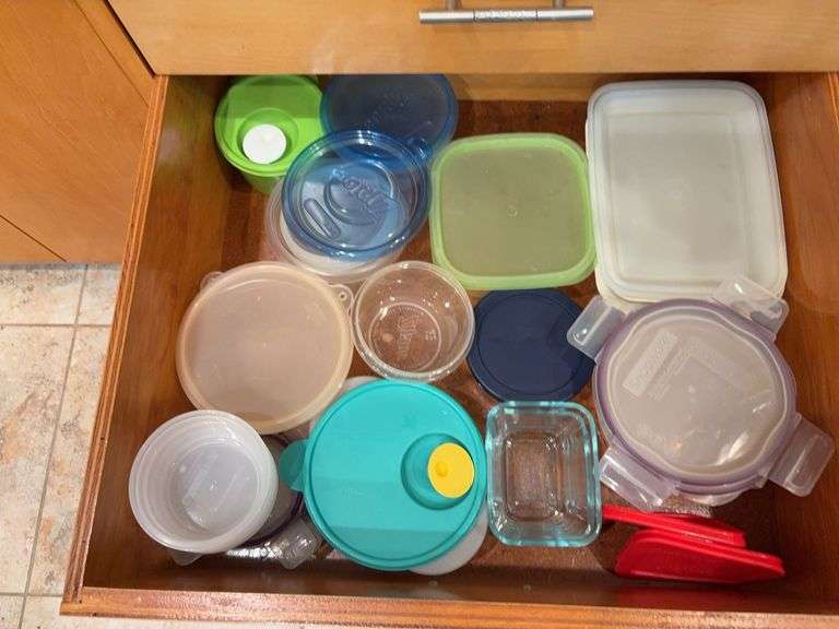 Another drawer of plastic storage containers including Tupperware & Pyrex “G” drawer image