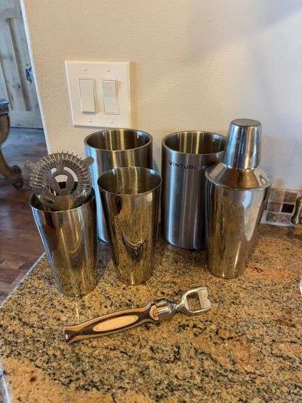 Wine decanters and martini shakers, bottle opener image