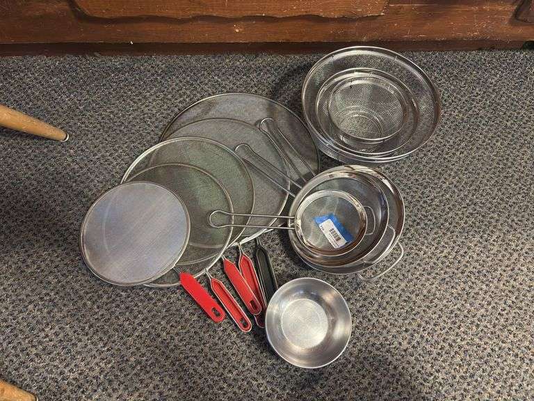 Set of mesh grease guards, set of three graduated mesh strainers, and set of three graduated colanders, set of three stainless bowls image
