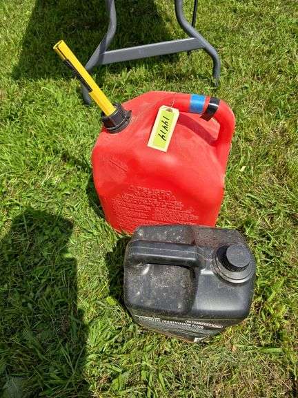 FULL 5 gallon gas can and 2 gallon Harvest King auto transmission fluid image