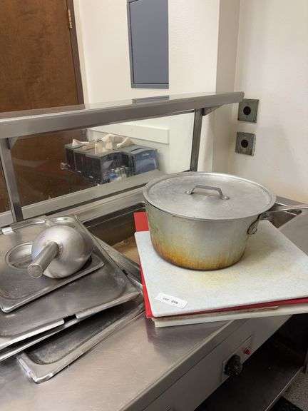 Cutting boards, pot, scoop and lids to server image