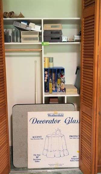 In closet includes card table, decorator glass for 30” round table, candlesticks, office supplies image