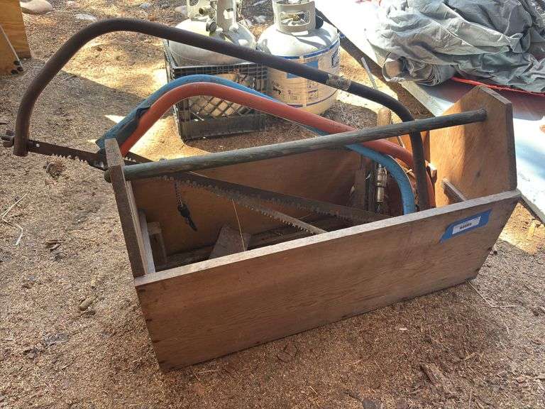 Old tool tote and saws plus other tools image