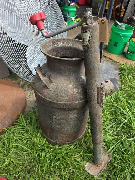 Cream can and trailer jack image