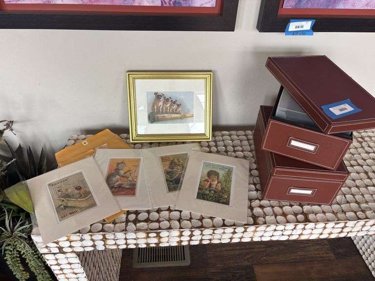 Advertising pictures and two leather photo boxes image