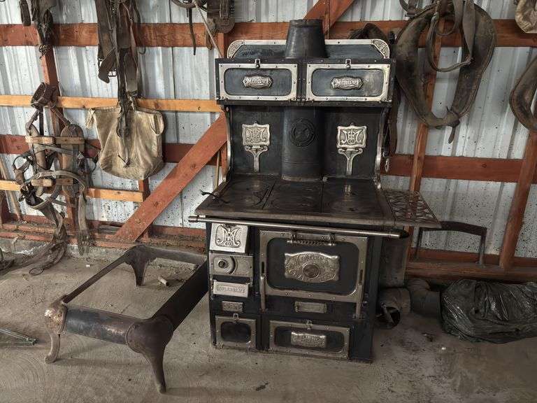Monarch nickel plated ornate antique cook stove 36 inches wide 30 inches deep 5 foot tall without the feet image