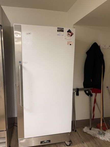 Artic Air Commercial Refrigerator on rollers, 32x28 1/2x75-working image