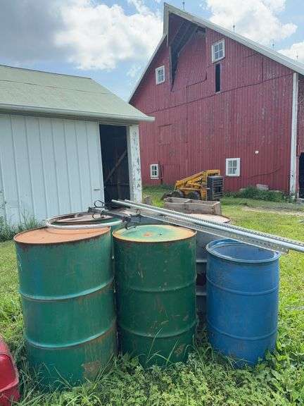 Five steel barrels image