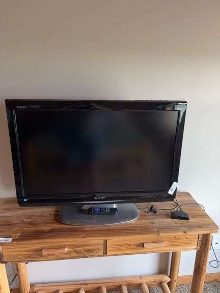 Sharp 32”  TV with roku and remote image