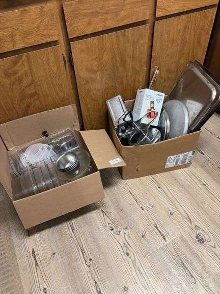 Two boxes plastic containers, stainless trays, napkin holder, phone system image