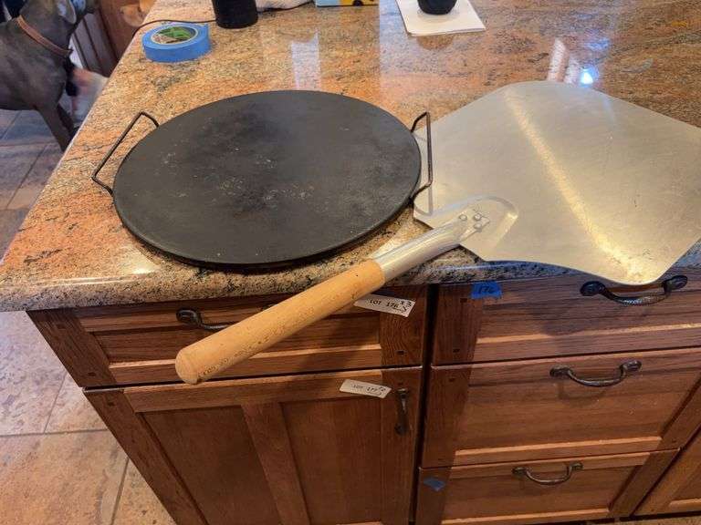 Pizza stone and tool image