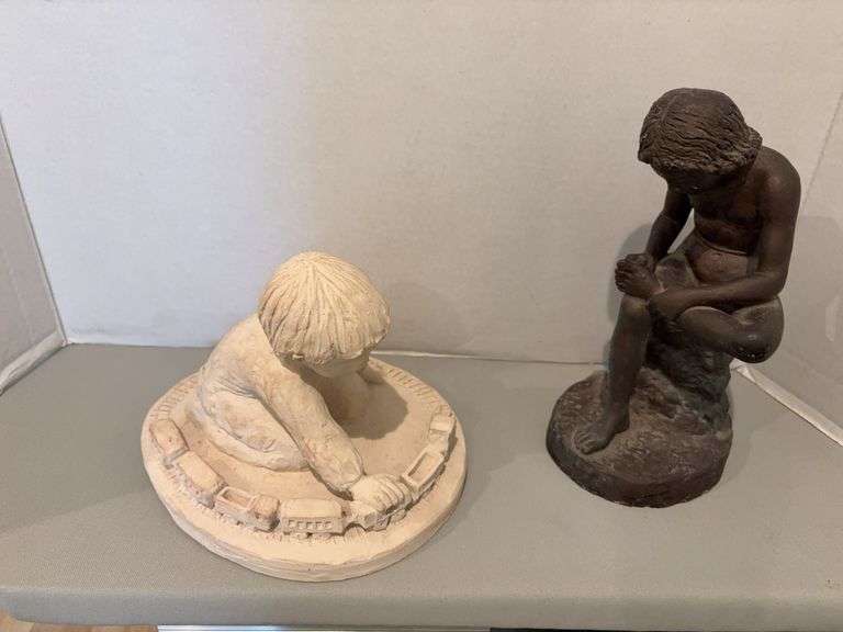 “Boy w Thorn” figurine and Dee Crowley “The Engineer” figurine image