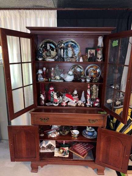 All Christmas in hutch includes LOTS of Santas and other decor image