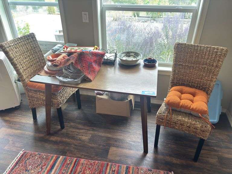 Small dining table with two ratan chairs 30 x 48 image