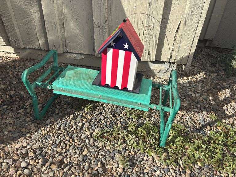 Garden kneeler and brand new metal birdfeeder image