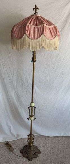 Approx 5’ tall two bulb floor lamp w pink fabric shade, brass? base image