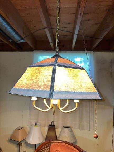 Hanging lamp with glass shade and fabric over the top of the glass Kinda unique! image