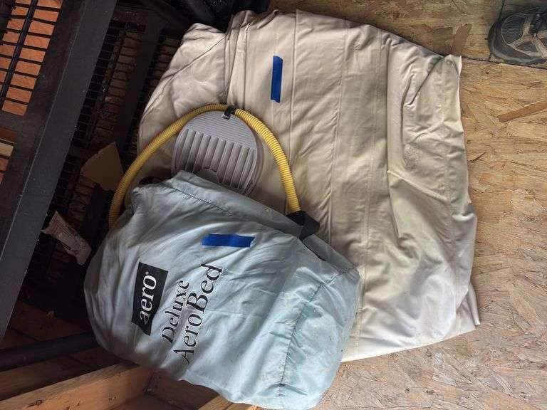 Two air beds with foot pump image