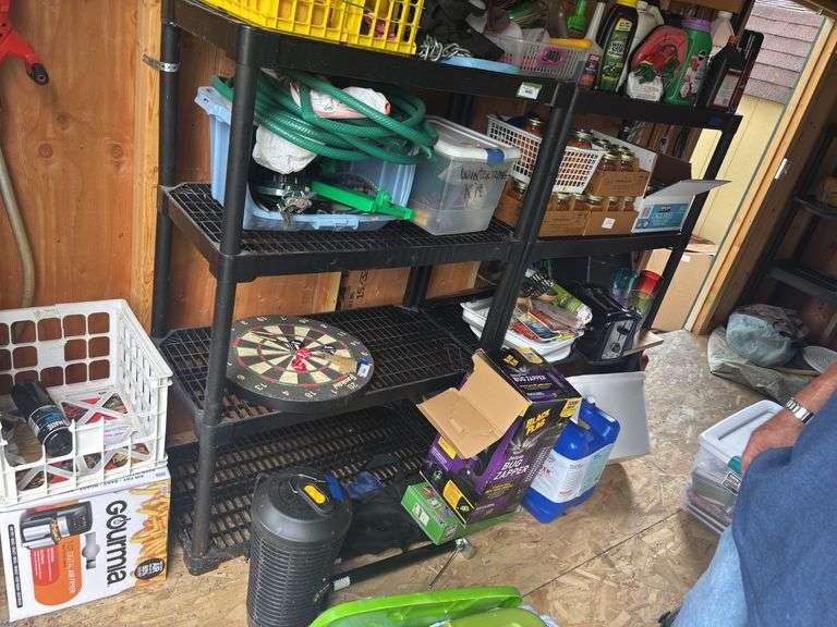Two plastic storage shelves image