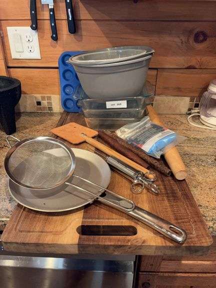 Baking dishes, large wood cutting board, Bug Green Egg baster, strainer, bowls, muffin tins-bring box image
