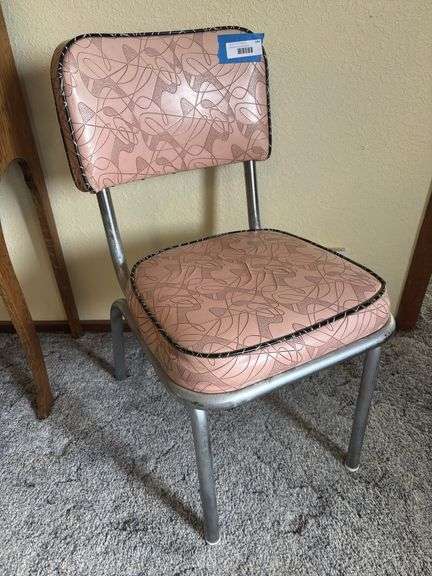 Vintage retro pink chrome leg chair does have one small split vinyl in the center of the seat image