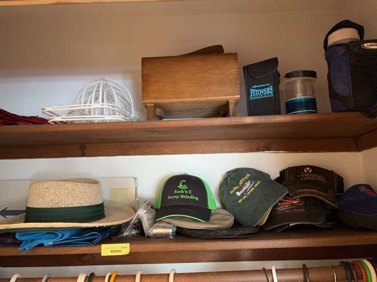 Remaining in closet includes camo jacket, pullovers, ball caps, shoe shine kit, etc image