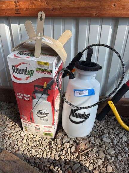 Two sprayers (one in box) and hose reel image
