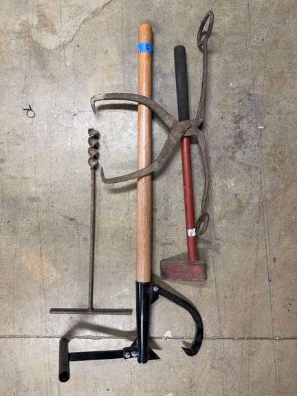 Lot with four items - Peavey/log jack, log carrier, splitting maul and hand drill image