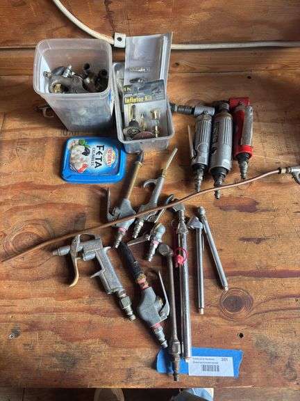 Assortment of air tools and attachments image