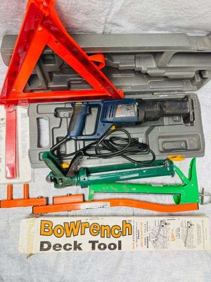 Miscellaneous lot with Ryobi corded reciprocating saw, bow wrench deck tool, siding gauge, fold-up safety triangle, and caulk guns 13" (2) image