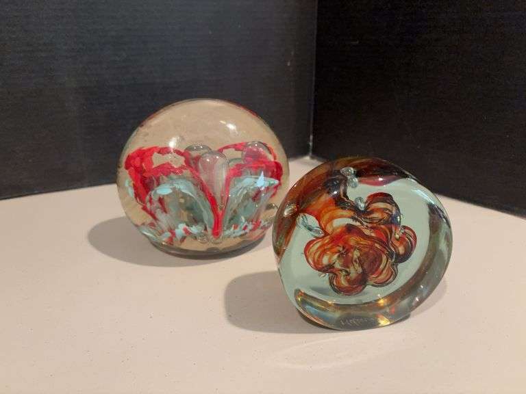 Two upright glass paperweights image
