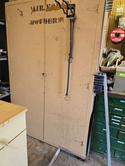 Wood double door storage cabinet 25D x 48L x 73H NO CONTENTS image